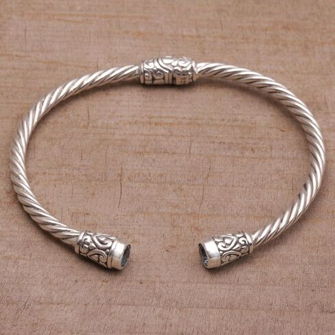 NOVICA Artisan Handmade Blue Topaz Cuff Bracelet .925 Sterling Silver from Bali Indonesia Birthstone 'Spiral Temple' in Saudi Arabia