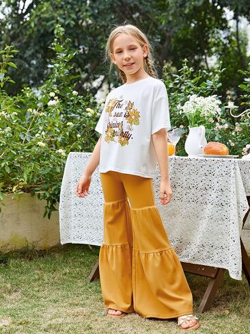 طقم تي شيرت WDIRARA للفتيات مكون من قطعتين بأكمام قصيرة وطبعة زهور وسروال بحاشية مكشكشة بأرجل واسعة in Kuwait