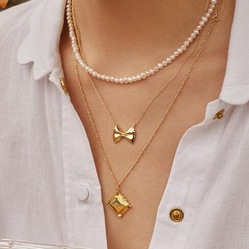 Wanderlust + Co Bow Tie Pasta Gold Necklace 14K Gold Plated Jewelry Hypoallergenic Shower-safe in Saudi Arabia
