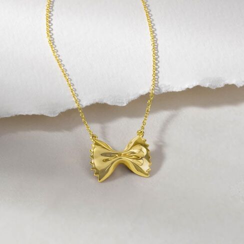 Wanderlust + Co Bow Tie Pasta Gold Necklace 14K Gold Plated Jewelry Hypoallergenic Shower-safe in Saudi Arabia