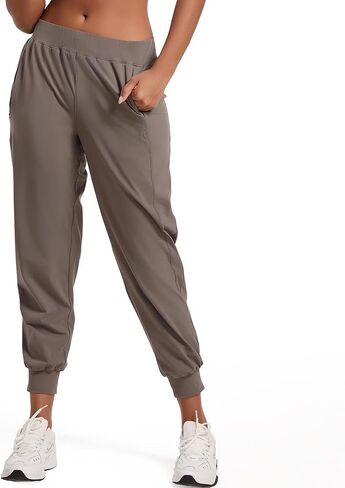 سراويل الركض النسائية من APWKL، سراويل رياضية خفيفة الوزن مع جيوب، سراويل رياضية بأساور مدببة سريعة الجفاف، صالة رياضية غير رسمية in Kuwait