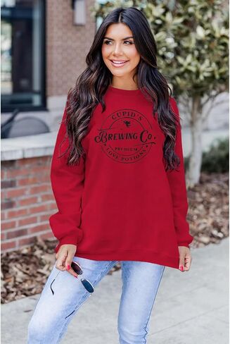 GLIGLITTR Valentine's Day Sweatshirt for Women Funny Leopard Love Heart Graphic Pullover Crewneck Long Sleeve Shirt Tops in Saudi Arabia