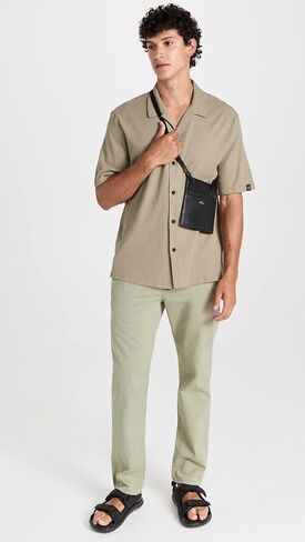 بنطال تشينو مطاطي من نسيج قطني طويل للرجال من Rag & Bone in Saudi Arabia