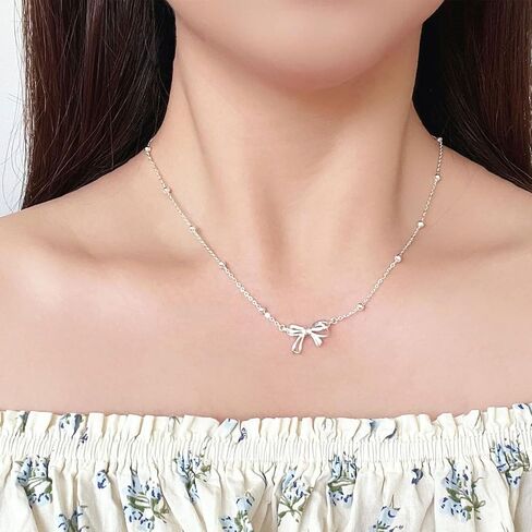 NORLSO Bow Necklace for Women Girls Rhinestone Bow Ribbon Pendant Necklace Gold Silver Bow Chain Necklace for Women Girls Jewelry Gift in Kuwait