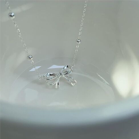NORLSO Bow Necklace for Women Girls Rhinestone Bow Ribbon Pendant Necklace Gold Silver Bow Chain Necklace for Women Girls Jewelry Gift in Kuwait