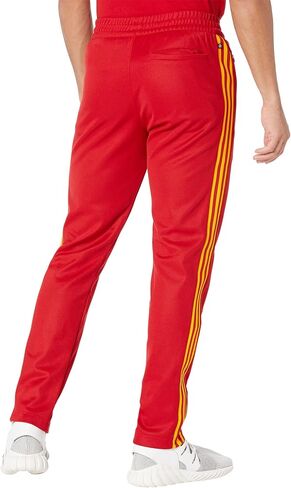 بنطال رياضي Beckenbauer من adidas Originals، Team Power Red/Team Collegiate Gold SM in Saudi Arabia