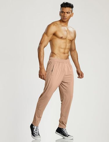Ouber Men's Quick Dry Gym Workout Pants Lightweight Athletic Running Pants with Zipper Pockets in Kuwait