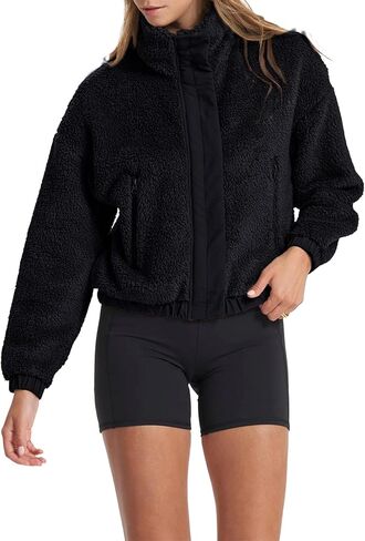 Lianlive سترات صوف شيربا للسيدات كاجوال كم طويل معطف شتوي غامض ملابس خارجية دافئة مع جيوب in Kuwait