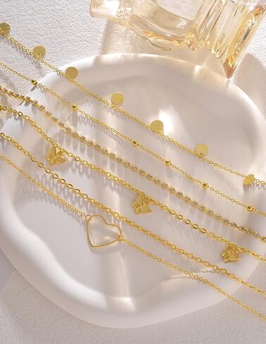 Akeoqi 6 قطع سلاسل خصر مطلية بالذهب عيار 18 قيراط خرز تشيكوسلوفاكيا لؤلؤ ترتر فراشة قلب سلسلة بطن صيفية للشاطئ بيكيني سلاسل الجسم مجموعة مجوهرات مثيرة للنساء قابلة للتعديل (29.5 بوصة + 7.8 بوصة) in Kuwait