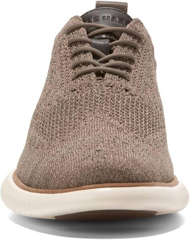 حذاء Cole Haan للرجال 2.Zerogrand Stitchlite Oxford، تروفل/عاجي، 7 in Kuwait