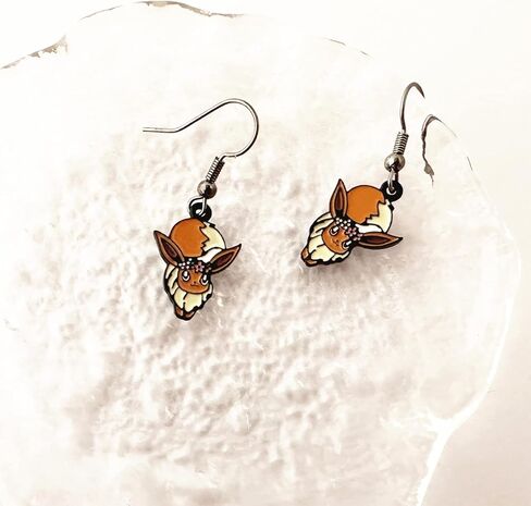 أقراط أذن الرسوم المتحركة Poke Eevee Enthusiast Evolutions Stud، مسمار أذن الرسوم المتحركة للفتيات والنساء والرجال in Kuwait