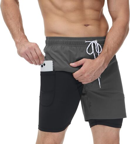 شورت سباحة رجالي من YuKaiChen ببطانة مضغوطة سريعة الجفاف على الشاطئ مع جيوب بسحاب in Kuwait