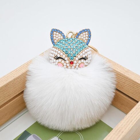 HOYUNLA Faux Rabbit Fur Ball Pom Pom Keychain with Fox Head Studded with pearl Rhinestone for Womens Bag Car Key Decoration in Saudi Arabia
