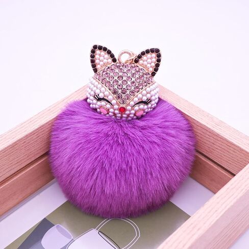 HOYUNLA سلسلة مفاتيح من فرو الأرنب الصناعي بوم بوم مع رأس ثعلب مرصع بحجر الراين اللؤلؤي لحقيبة المرأة لتزيين مفتاح السيارة in Kuwait