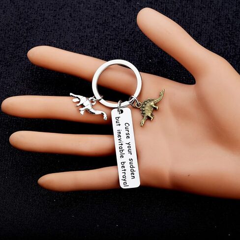 bobauna Curse Your Sudden But Inevitable Betrayal Inspired keychain With Dinosaur Charm Travel Dinosaur Lover Gift in Saudi Arabia