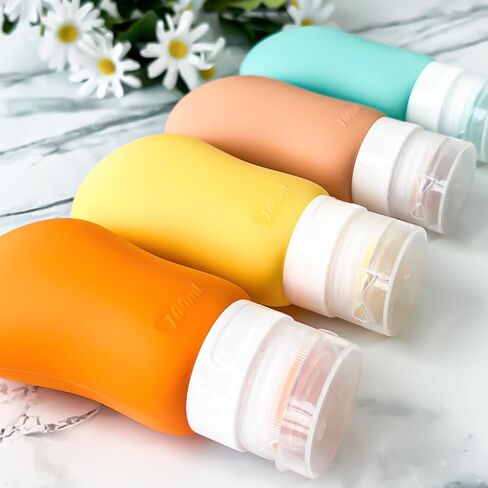 Fiwzzdur 24 مجموعة زجاجات بحجم السفر لمستلزمات الزينة، حاويات أدوات الزينة المعتمدة من إدارة أمن المواصلات الأمريكية للسفر، مجموعة برطمانات سفر من السيليكون المحمولة مانعة للتسرب وقابلة للعصر للعطور والشامبو والبلسم in Kuwait