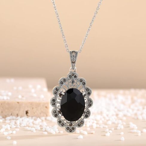 Mytys Coin Pendant Necklace for Women Gold and Silver Intertwined Crossover Pendant Two Tone Necklace in Kuwait