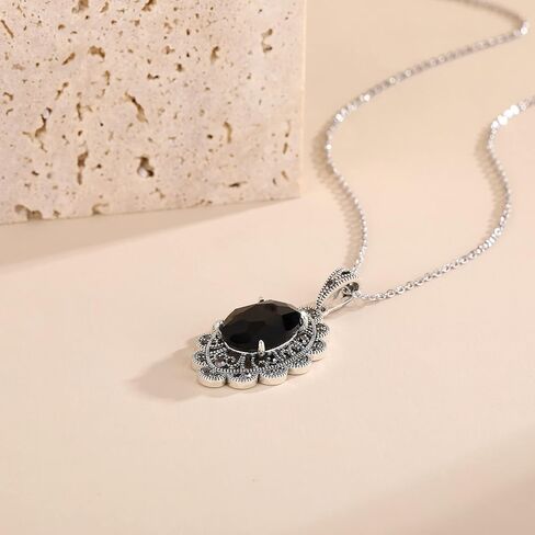 Mytys Coin Pendant Necklace for Women Gold and Silver Intertwined Crossover Pendant Two Tone Necklace in Kuwait