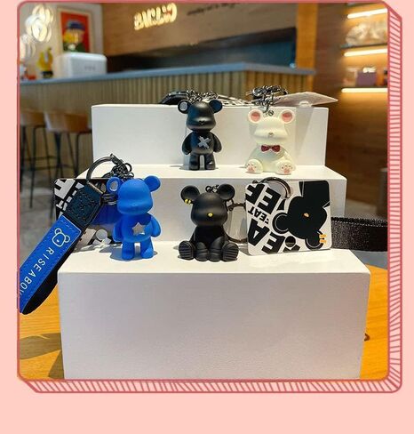 HSYHERE Men Women Boy Girl Cool Simple Fashionable Bowknot Star Bear Keychain Christmas Gift Bag Pendant Metal Key Ring in Saudi Arabia