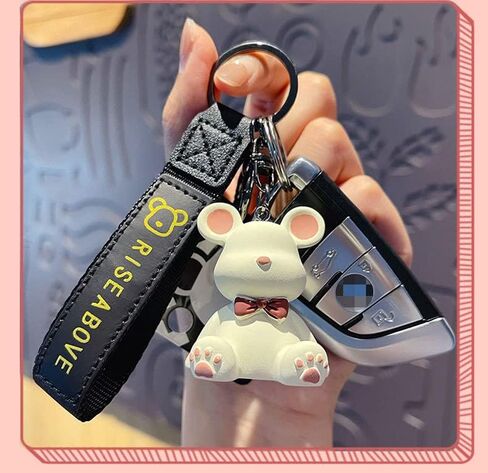 HSYHERE Men Women Boy Girl Cool Simple Fashionable Bowknot Star Bear Keychain Christmas Gift Bag Pendant Metal Key Ring in Saudi Arabia
