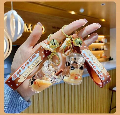 HSYHERE Men Women Creative Interesting Floating Milk Tea Brown Bear Lucky Bottle Keychain Keyrings in Kuwait