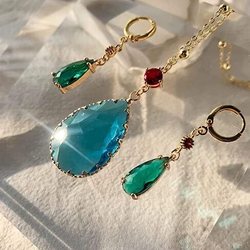 مجموعة أقراط وقلادة من Howls Green Water في مجوهرات Howls Moving Castle - الرسوم المتحركة اليابانية المفضلة المستخدمة كإكسسوارات تنكرية أو هدايا مجوهرات للحفلات التنكرية والنساء والرجال ومحبي الرسوم المتحركة. in Kuwait