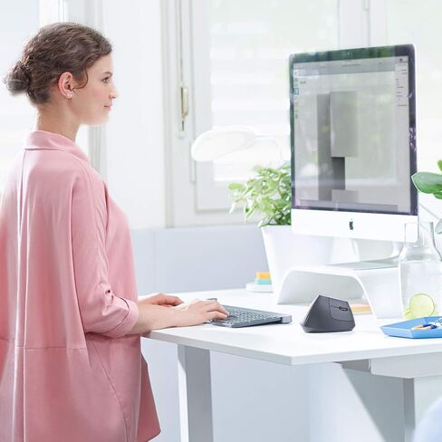 Logitech MX Vertical Wireless Mouse – Ergonomic Design Reduces Muscle Strain, Move Content Between 3 Windows and Apple Computers, Rechargeable, Graphite - With Free Adobe Creative Cloud Subscription in Saudi Arabia
