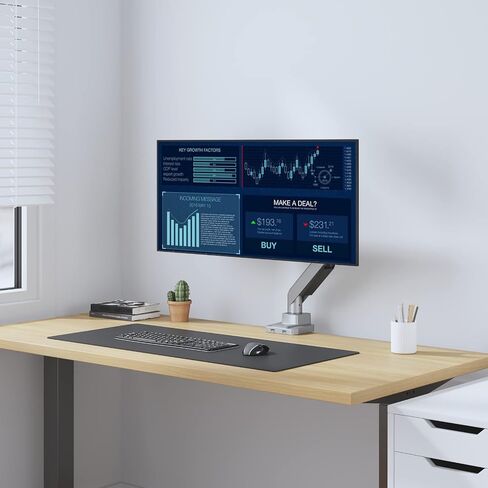 WALI Single Monitor Gas Spring Desk Mount, Heavy Duty Monitor Arm for Ultrawide Screen up to 35 inch, 33 lbs. Fully Adjustable, Mounting Holes 75 and 100 (GSM001XL), Black in Saudi Arabia