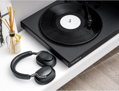 مشغل تسجيل فينيل فضي عالي الدقة من Victrola، خرطوشة Ortofon 2M حمراء، اتصال بلوتوث متكيف aptX، مخرج RCA ومخرج Preamp مطلي بالذهب، مشغل تسجيل بلوتوث أنيق وأنيق in Saudi Arabia