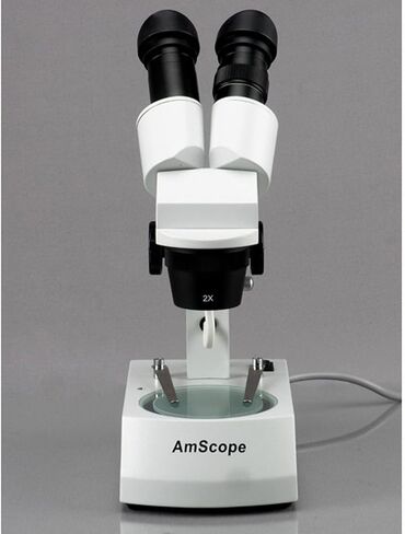 AmScope SE305-AX مجهر ستيريو ثنائي العينين، عدسات WF5x وWF10x، تكبير 5X/10X/15X/30X، أهداف 1X و3X، إضاءة هالوجين علوية وسفلية، لوحة مسرح سوداء/بيضاء قابلة للعكس، حامل ذراع، 120 فولت in Saudi Arabia