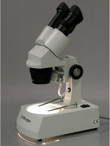 AmScope SE305-AX مجهر ستيريو ثنائي العينين، عدسات WF5x وWF10x، تكبير 5X/10X/15X/30X، أهداف 1X و3X، إضاءة هالوجين علوية وسفلية، لوحة مسرح سوداء/بيضاء قابلة للعكس، حامل ذراع، 120 فولت in Saudi Arabia