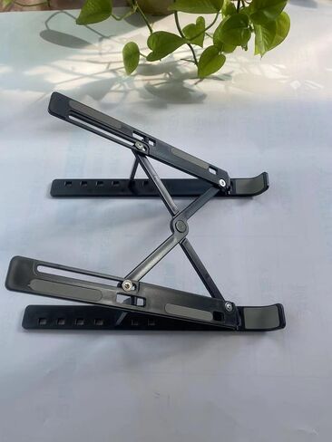 AOOF Laptop Stand N3 Folding Vertical Plastic Portable Lifting Desktop Cooling Base Bracket Black in Saudi Arabia