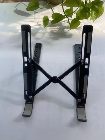 AOOF Laptop Stand N3 Folding Vertical Plastic Portable Lifting Desktop Cooling Base Bracket Black in Saudi Arabia