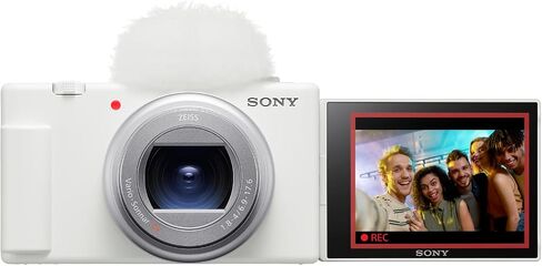 كاميرا Sony ZV-1 II Vlog مع فيديو بدقة 4K ودقة 20.1 ميجابكسل لمنشئي المحتوى ومدوني الفيديو، حزمة ZV-1M2/W باللون الأبيض مع حقيبة Deco Gear + بطاقة ذاكرة سعة 64 جيجابايت + مقبض/حامل ثلاثي القوائم 2 في 1 + مجموعة برامج + ملحقات in Saudi Arabia