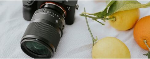 عدسة سيجما 303965 35 ملم F1.4 DG DN Art لمجموعة كاميرات Sony E-Mount بدون مرآة مع بطاقة Lexar Professional 1066x64GB SDXC UHS-I in Kuwait