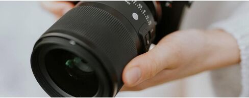 عدسة سيجما 303965 35 ملم F1.4 DG DN Art لمجموعة كاميرات Sony E-Mount بدون مرآة مع بطاقة Lexar Professional 1066x64GB SDXC UHS-I in Kuwait