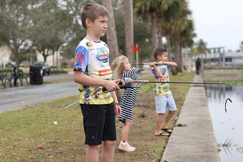 Kid Casters Black/Orange Camo No Tangle Fishing Combo with Bobber, Practice Casting Plug in Kuwait