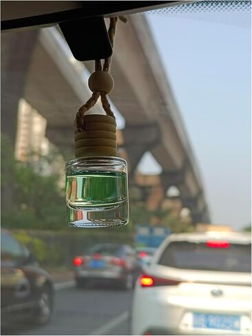8 قطع 8 مل زجاجة عطر معلقة للسيارة، موزع معطر هواء من الزجاج الشفاف، ناشر أساسي أسطواني فارغ، زيت عطري للعلاج العطري، قوارير قلادة من الزيت العطري مع أغطية خشبية in Kuwait