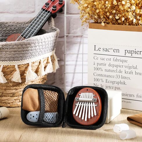 كونوهان 7 قطع 8 مفاتيح ميني كاليمبا بيانو مجموعة هدايا عيد الميلاد للأطفال، إبهام الإصبع مع سلسلة حبل، واقي وقماش تنظيف للأطفال البالغين المبتدئين الموسيقيين (نمط قطرة) in Kuwait