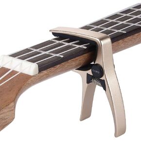Mini Size Professional 4 String Guitar Capo, Ukulele Capo (GOLD) in Saudi Arabia