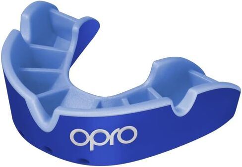 واقي الفم ذو المستوى الفضي من OPRO + حزام، واقي الفم الرياضي للبالغين والشباب، يتميز بتقنية ملائمة ثورية لكرة القدم الأمريكية، لاكروس، الهوكي، الرياضات القتالية (أسود، شبابي) in Kuwait