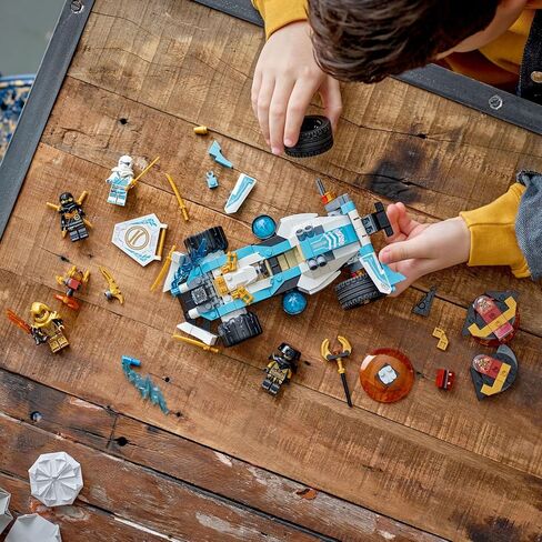 LEGO NINJAGO Zane’s Dragon Power Spinjitzu Race Car 71791 Building Toy Set, Features a Ninja Car, 2 Hover Flyers, Dragon Toy, and 4 Minifigures, Gift for Kids Aged 7+ in Saudi Arabia