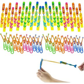 Ynybusi 50 Pcs Slingshot Outdoor Toys,Glow in The Dark Party Favor Toys Rocket with Launcher,LED Light Up Helicopter Toys,Glow Sticks Birthday Christmas Gifts Party Favors for Kids 4-8-12 Bulk Toys in Saudi Arabia