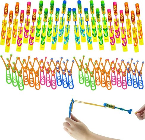 Ynybusi 50 Pcs Slingshot Outdoor Toys,Glow in The Dark Party Favor Toys Rocket with Launcher,LED Light Up Helicopter Toys,Glow Sticks Birthday Christmas Gifts Party Favors for Kids 4-8-12 Bulk Toys in Saudi Arabia