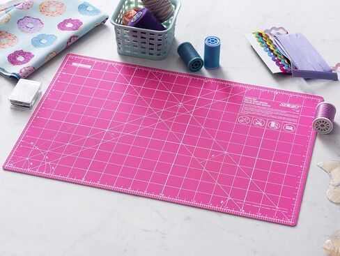 OLFA 12" x 18" Self Healing Rotary Cutting Mat (RM-CG/PIK) - Double Sided 12x18 Inch Cutting Mat with Grid for Fabric, Sewing, Quilting, & Crafts, Designed for Use with Rotary Cutters (Pink) in Saudi Arabia