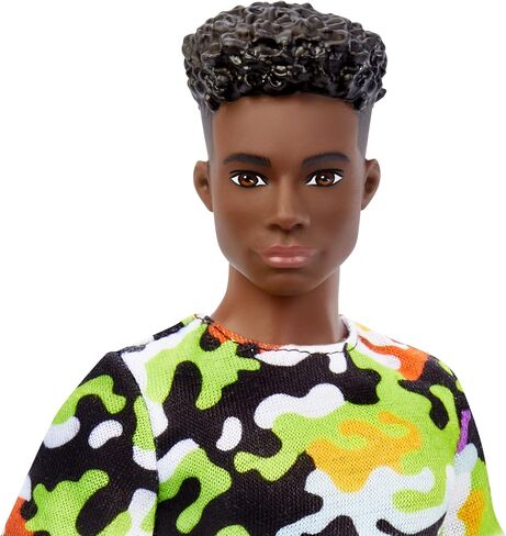 Barbie Ken Fashionistas Doll, Broad, Black Curly Hair, Multi-Colored Camo Print Shirt, Neon Green Shorts, Silvery Sneakers, Toy for Kids 3 to 8 Years Old in Saudi Arabia