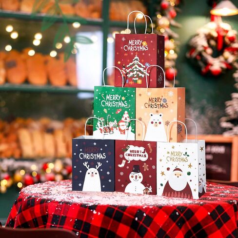 24 قطعة من أكياس هدايا عيد الميلاد الورقية من ILEBYGO بتصميمات متنوعة، 3 أحجام من أكياس هدايا عيد الميلاد مع مقابض لمستلزمات حفلات عيد الميلاد والفصول المدرسية (8 جامبو، 8 كبيرة، 8 متوسطة) in Kuwait