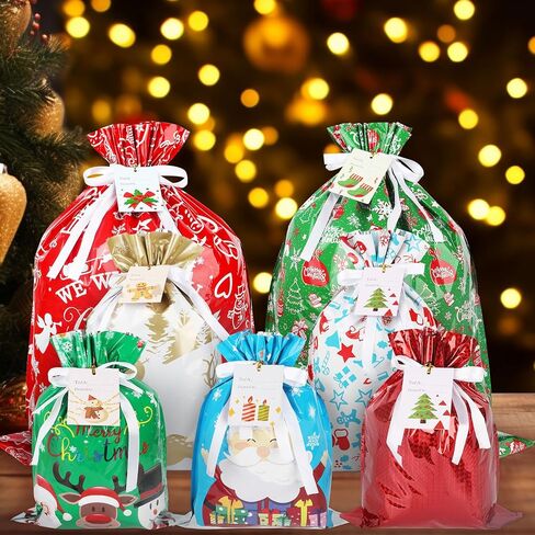 أكياس هدايا عيد الميلاد من كيشمنيو، أكياس هدايا برباط مع علامات شريطية لهدايا العطلات، 20 قطعة من أكياس تغليف هدايا عيد الميلاد من رقائق الكريسماس لهدايا عيد الميلاد (كبيرة متوسطة صغيرة) in Kuwait