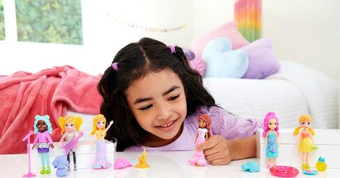 Polly Pocket Travel Toy with Two (3-Inch) Dolls & 25 Accessories, Outer Space Fashion Pack with 2 Glow-In-The-Dark Pieces in Saudi Arabia