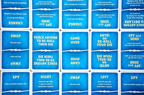 USAOPOLY What The Cup!? | Social Bluffing Dice Game | Featuring Handheld Dice Cups & D12 Dice | Spy, Swap, Steal The Winning Cup | 3-6 Players, Ages 12+ in Saudi Arabia
